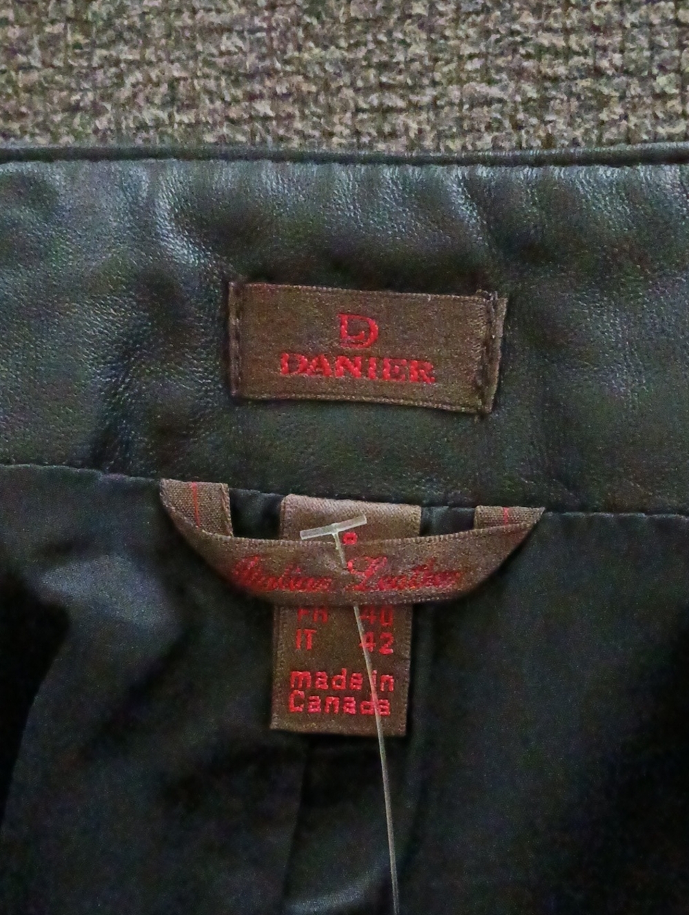 Danier Black Leather Pants with Red Branding.